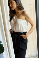 one-shoulder jumpsuit in white black
