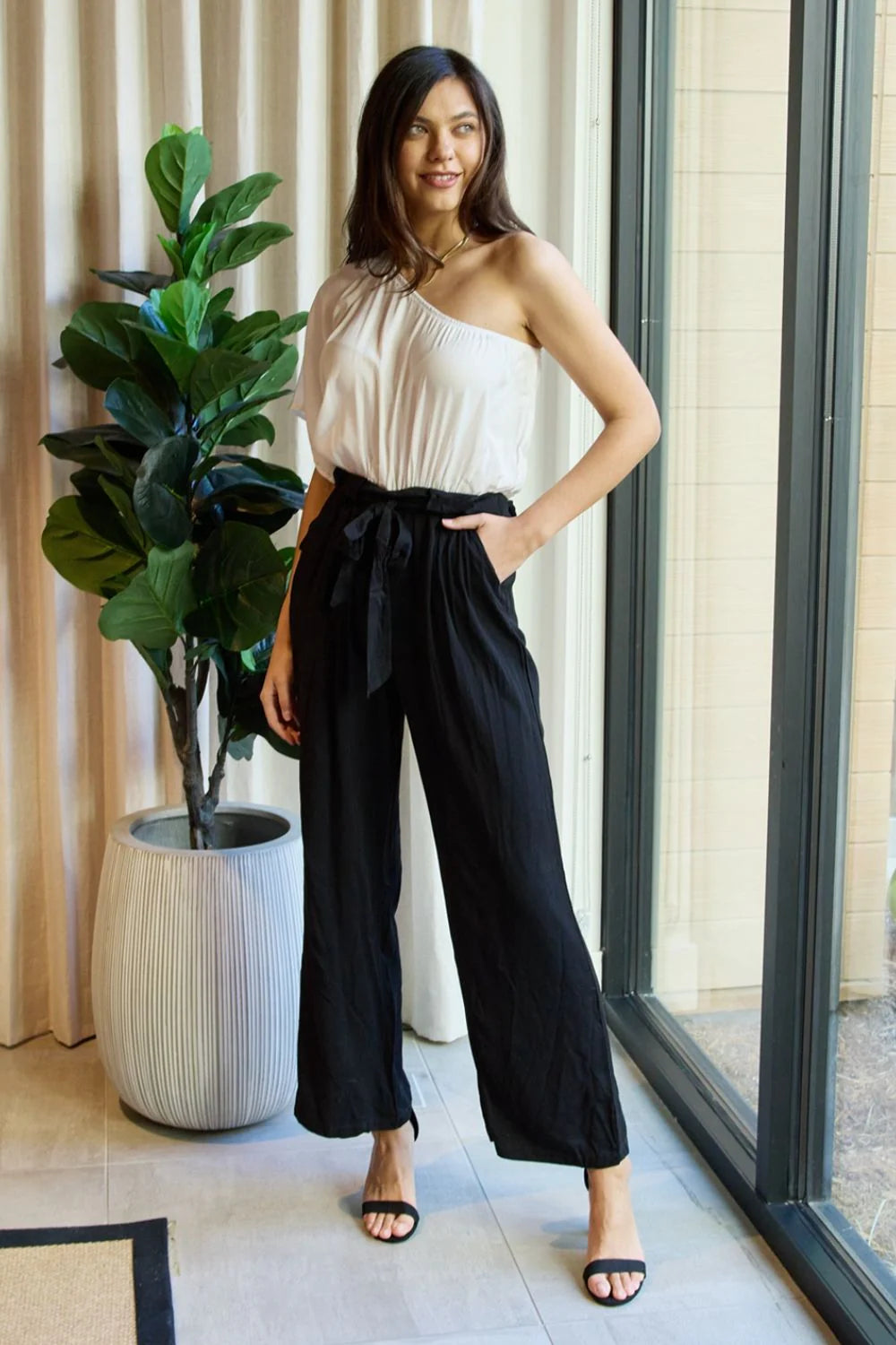 one-shoulder jumpsuit in white black