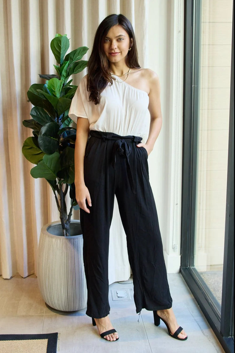 one-shoulder jumpsuit in white black